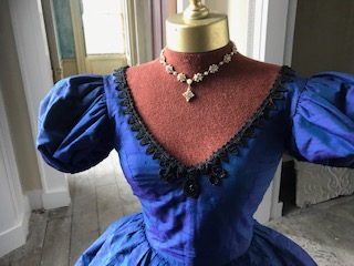 A lady's dark blue shot silk with jet Victorian style crinoline evening gown (small size)